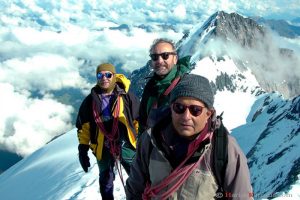 Harish (right) with Pakistani climbers on summit of Monch