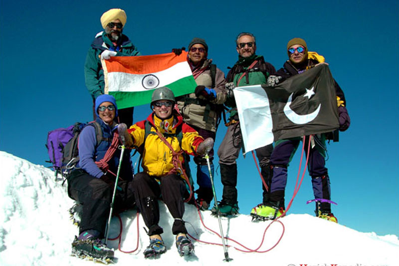 Indian-Pakistani climbers on summit of Monch in The Alps to promote Peace Park in the Siachen