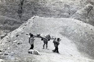Carried on improvised stretcher