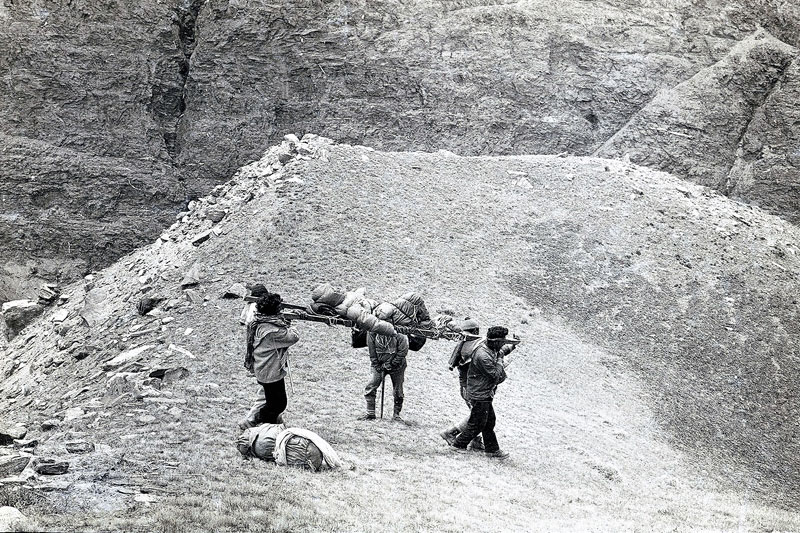 Carried on improvised stretcher